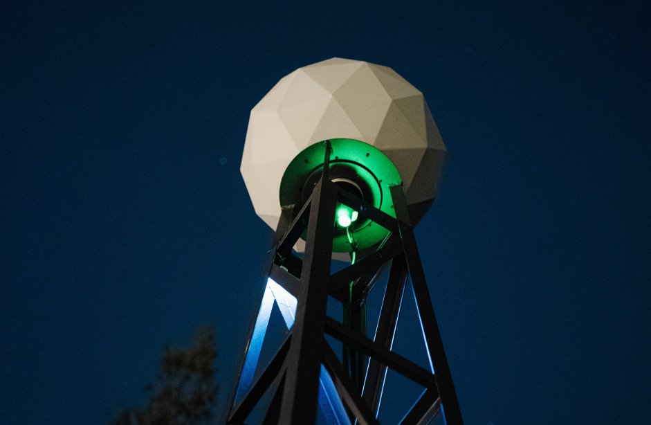 Hillel Roman, Providence, 2024, observation tower, stone hut, cctv camera and projector, Ananeh art center